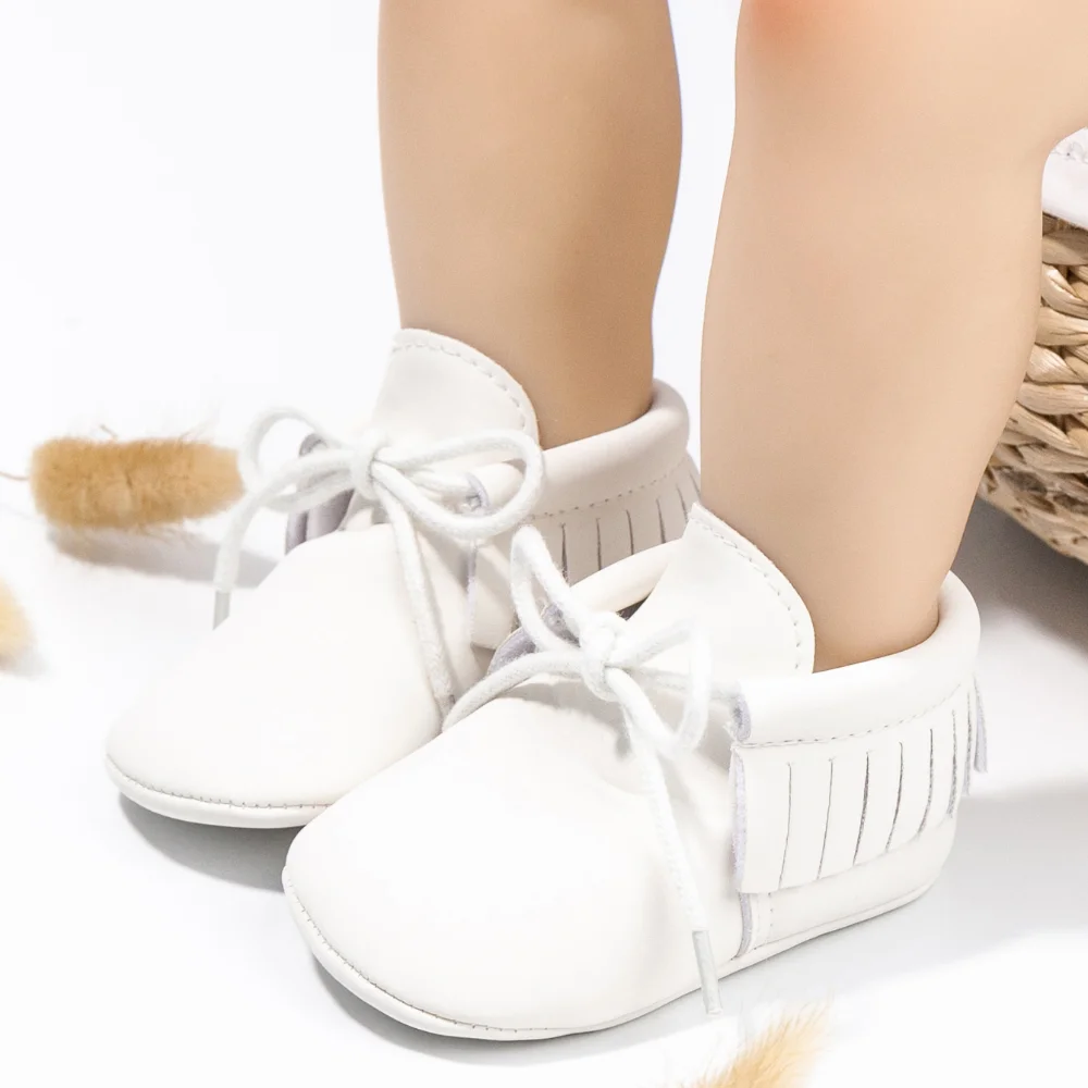 الوليد الطفل حذاء كاجوال عالية الجودة لينة الدافئة المضادة للانزلاق الربيع والخريف شرابة جلد أحذية الوليد الأولى ووكر سرير الأحذية