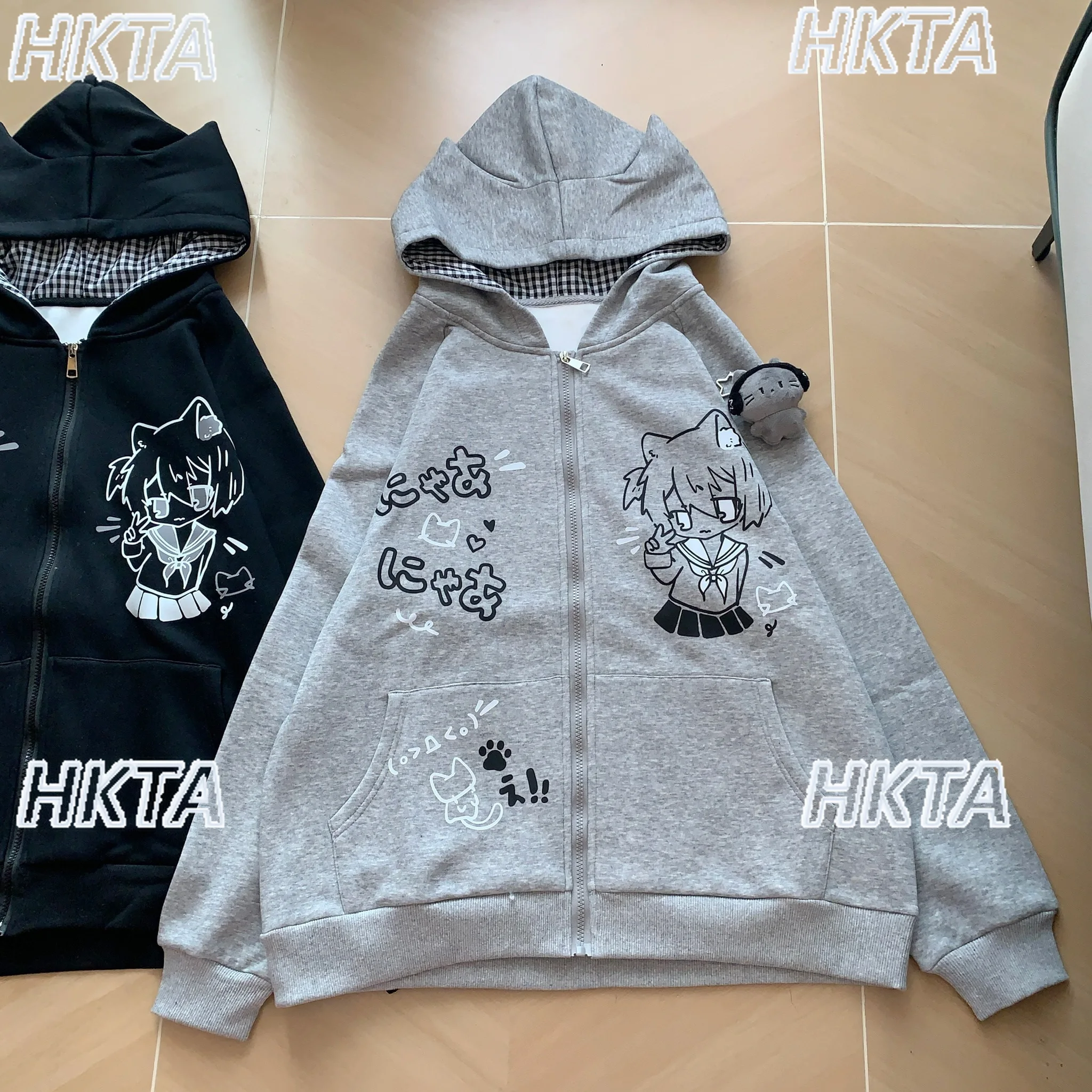 Dulce diario a cuadros lindo estampado de dibujos animados de manga larga sudaderas con capucha abrigo de invierno cálido chaqueta de terciopelo suelta bidimensional para mujer