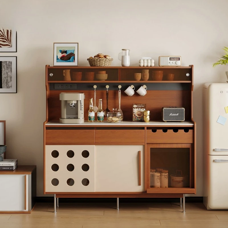 

Medieval style solid wood sideboard Modern polka dot elements are integrated against the wall