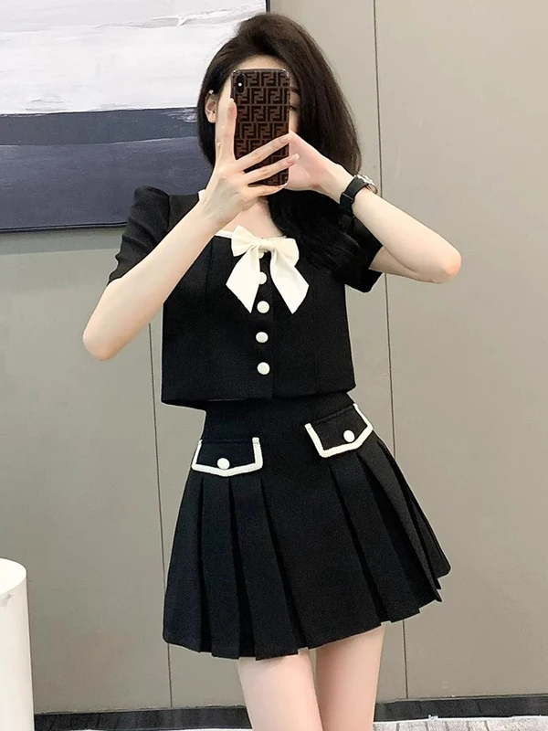 กระโปรงสีดําเอวสูงกระชับสัดส่วนชุดสตรี Ele ความรู้สึกขั้นสูงเส้นใยโพลีเอสเตอร์ยาว Sve รอบ Ne Top