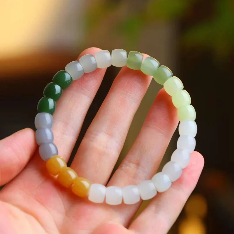 

Hetian, нефрит Biji, теплый белый, фиолетовый, зеленый озеро, желтый рот, сахарный материал, прямая резка