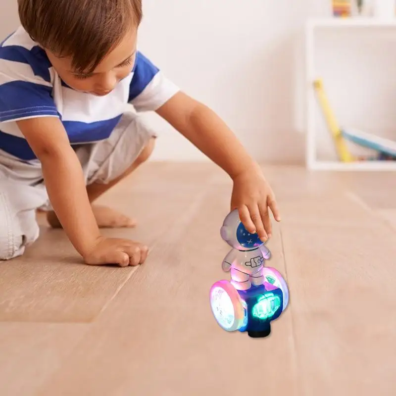 Luz brilhante brinquedo elétrico astronauta equilíbrio carro música brinquedo movimento ativado light-up carro para criança luz colorida imprensa & ir