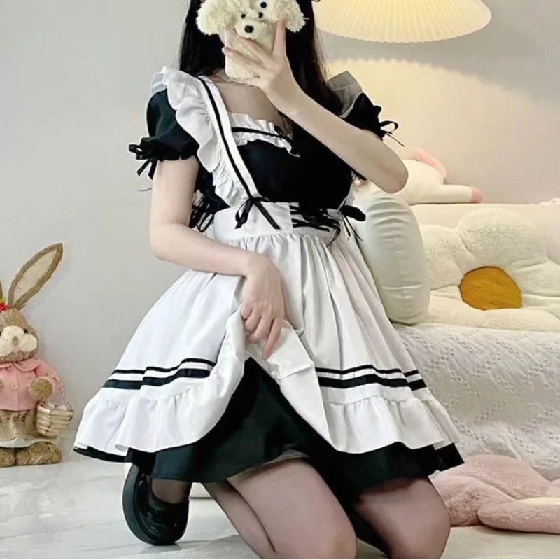 Japanese Cute Student Lolita Maid 2024 Spliced Pullover One Line Neck with Ruffle Edge Bow Fashion Slim Fit Short Sleeved Dress