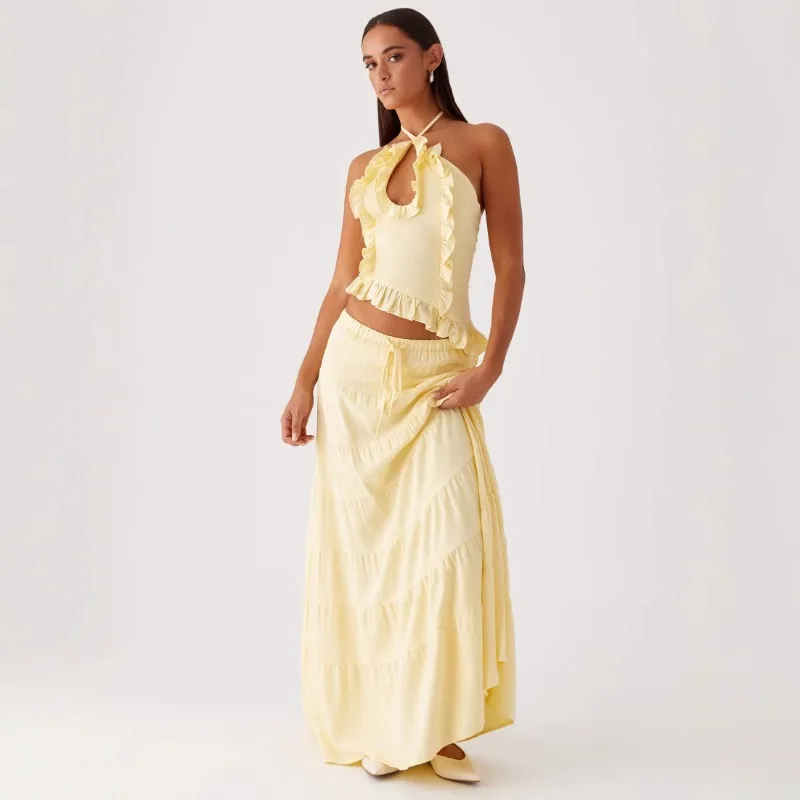 

Женский комплект одежды из 2 предметов, топ на шнуровке с лямкой на шее, нерегулярная отделка с рюшами и вырезом + длинная струящаяся юбка трапециевидной формы на талии с завязками