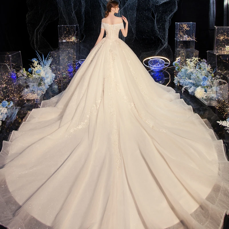 Abito da sposa leggero, velo principale della nuova sposa, temperamento lussuoso, stile palazzo monospalla, abito da sposa con strascico del cielo stellato