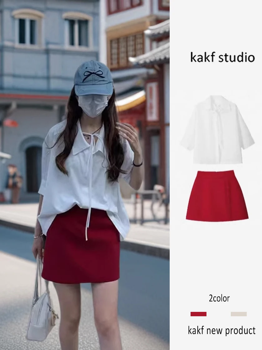 Hoge taille A-lijn rok en witte irt tweedelige set voor dames zomer faion luxe gevoel rode kleur straat sle