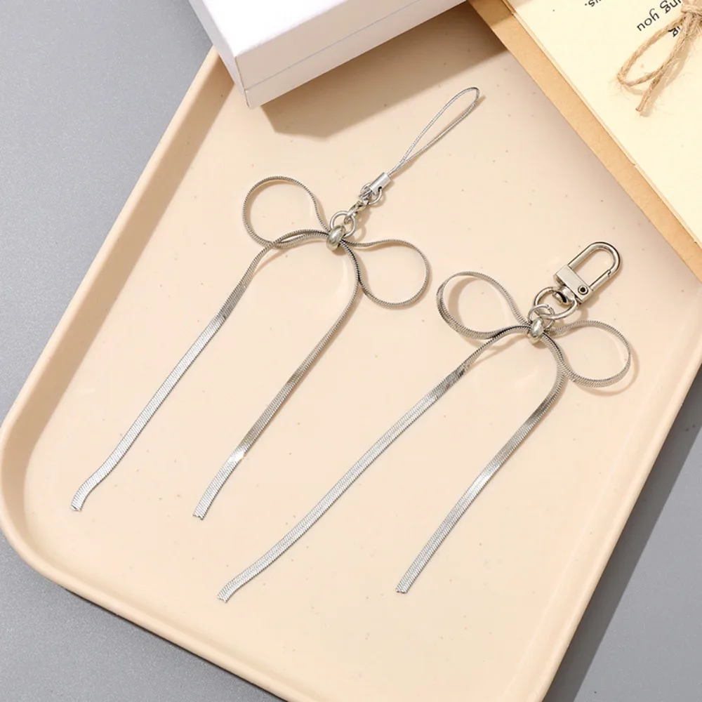 

Металлический бант, подвеска для мобильного телефона, брелок из змеиной кости, простая веревка для телефона, подвесной шнур, цепочка для мобильного телефона с защитой от потери