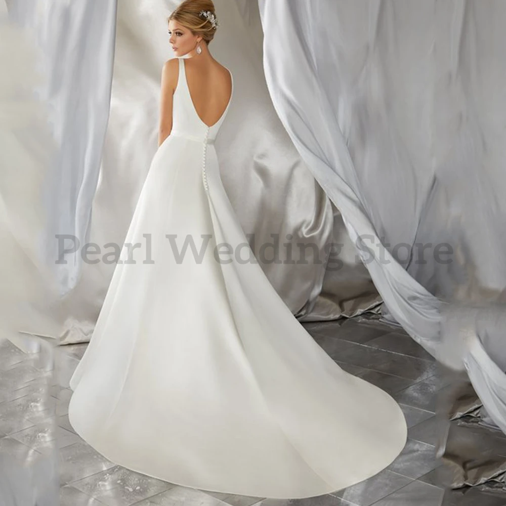 Semplici abiti da sposa bianchi con tasca e cintura scollo a v lunghezza del pavimento con strascico classico Backless Multi Size abiti da sposa