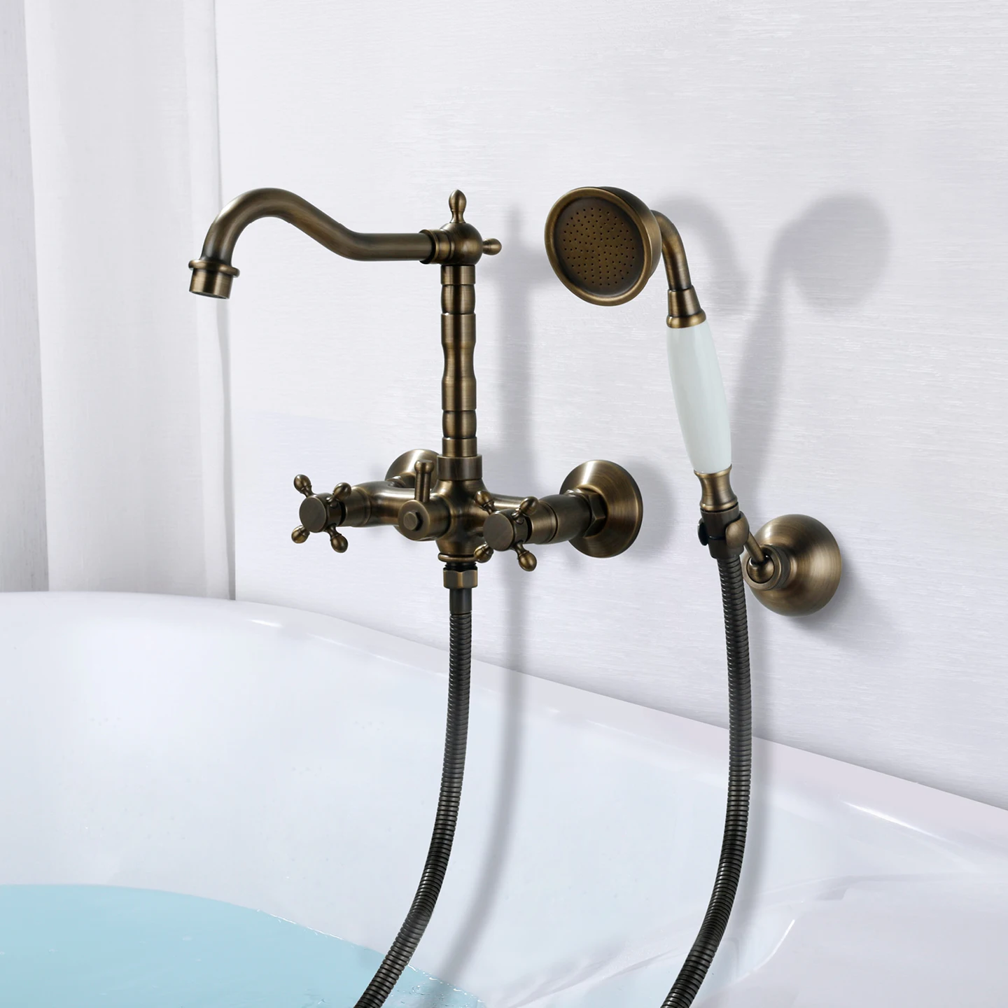 

Antique Roman Tub Faucet with Handheld Shower Wall Mounted Dual Hole Bathtub Sink Faucet Two Handle Hot and Cold Mixer Taps