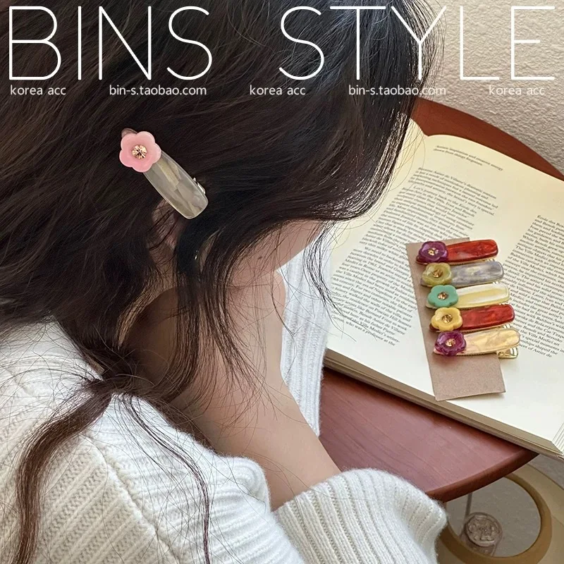 

Korean cute sweet girl rhinestone flower hairpin ink contrast color triangular water drop duck bill clip side bangs clip