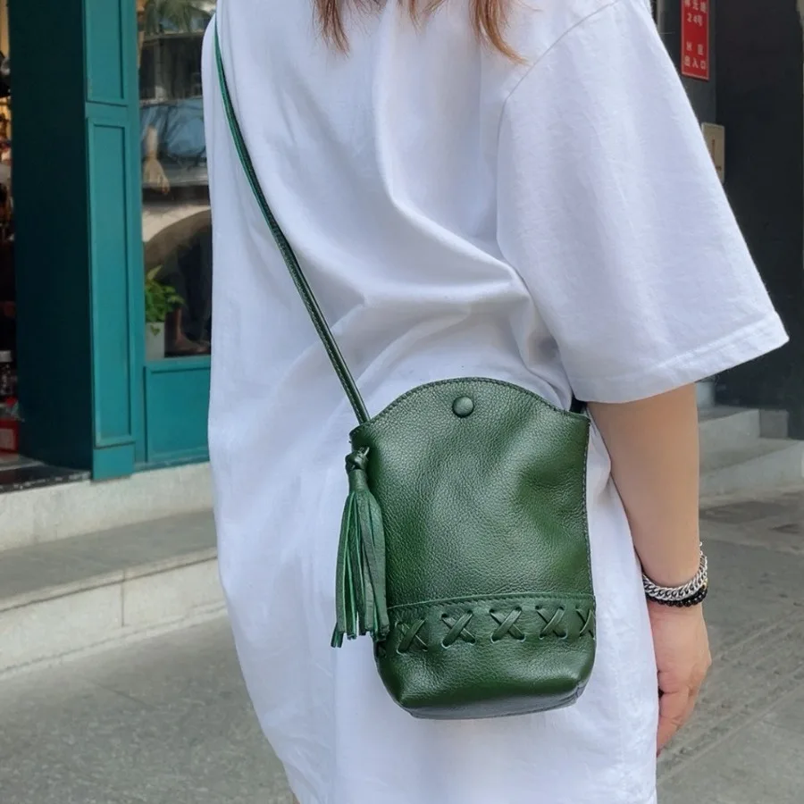 

Premium leather diagonal cross compact and lightweight mobile phone bag with leather cover layer, carrying shoulder bag