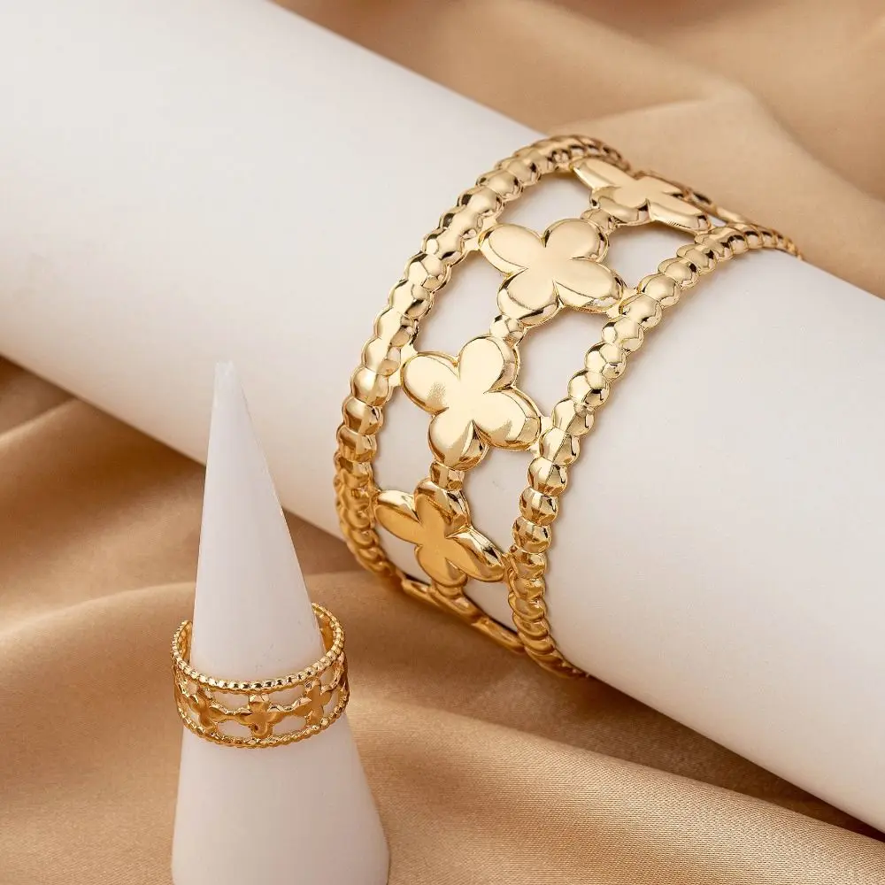 Exquisito brazalete de flores con forma de trébol, diseño floral, brazalete de flores huecas, técnica de fundición, brazalete ancho, pulsera abierta para niñas