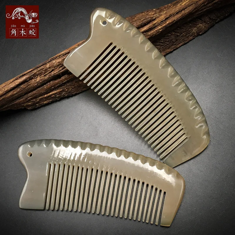 

Маленькая расческа из белого рога яка, сделано в Гуанси