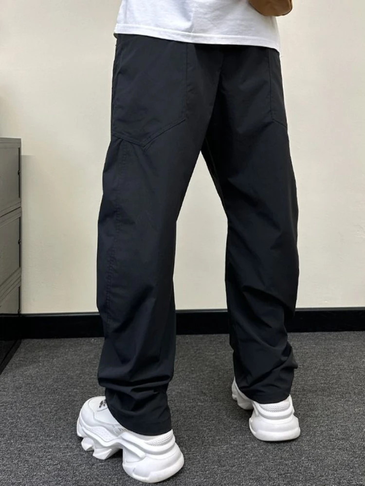 Calças casuais baggy homem solto novo na tendência estética roupas clássicas harajuku moda venda 2025 tamanho grande xxxl calças para homem