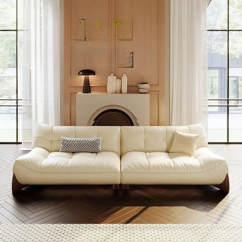 Foshan modern simple leather sofa living room size apartment concubine light luxury lazy cream wind cloud sofa