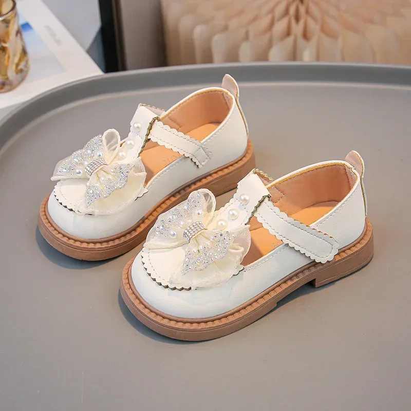 Girls Leather Shoes T-strap Shiny Sweet Bows 2025 Fashion Kids Flat Shoes Non-slip Soft Sole Children Princess Shoes Round Toes