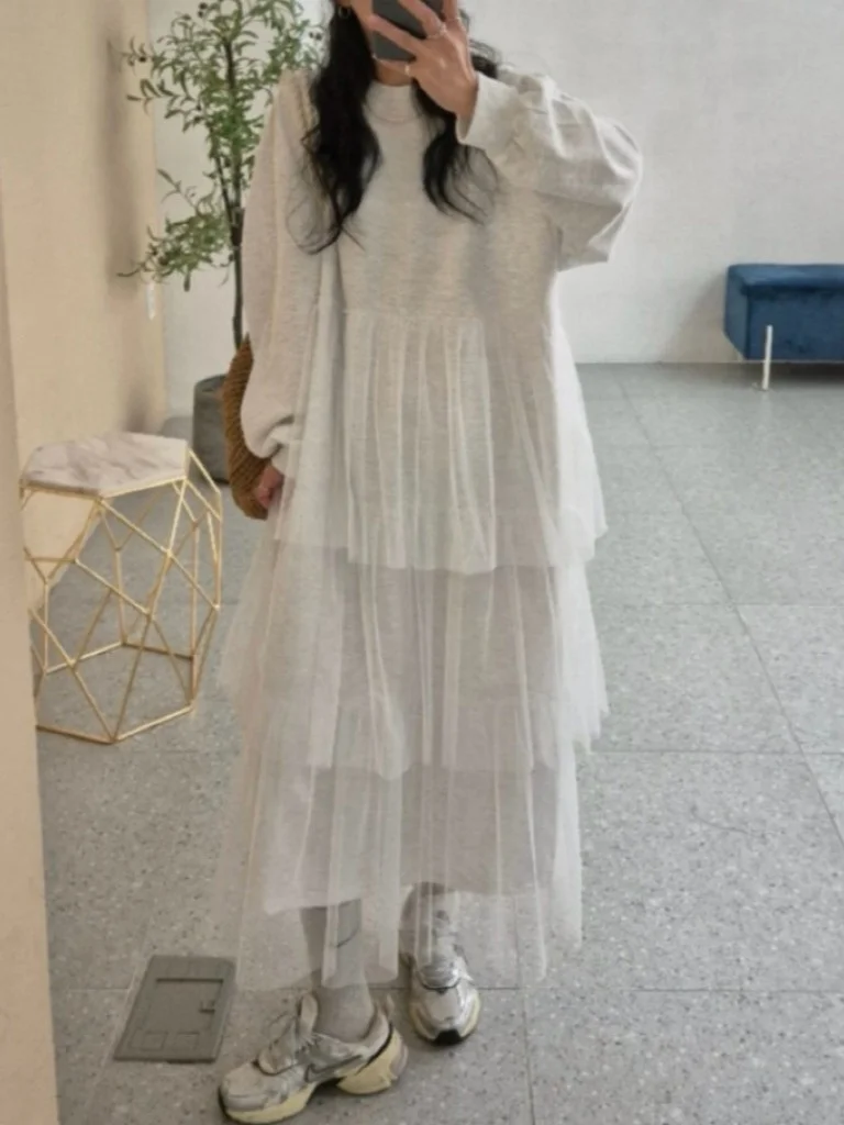 

Шикарная осенняя возрастная юбка с буквенным принтом, сращенная сетчатая юбка-торт, толстовка Dr, женская модная транссезонная длинная...