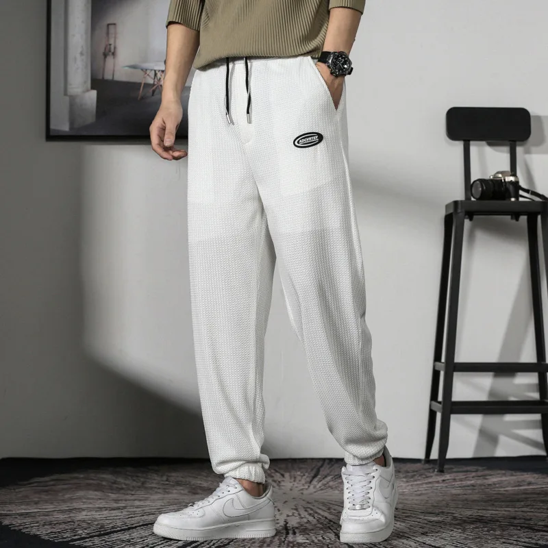 

Summer men's Korean style fashionable versatile solid color ice silk ankle binding loose casual jogging sports cropped pants