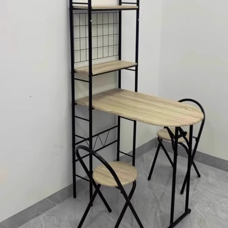 Folding tables and chairs against the wall are light and luxurious