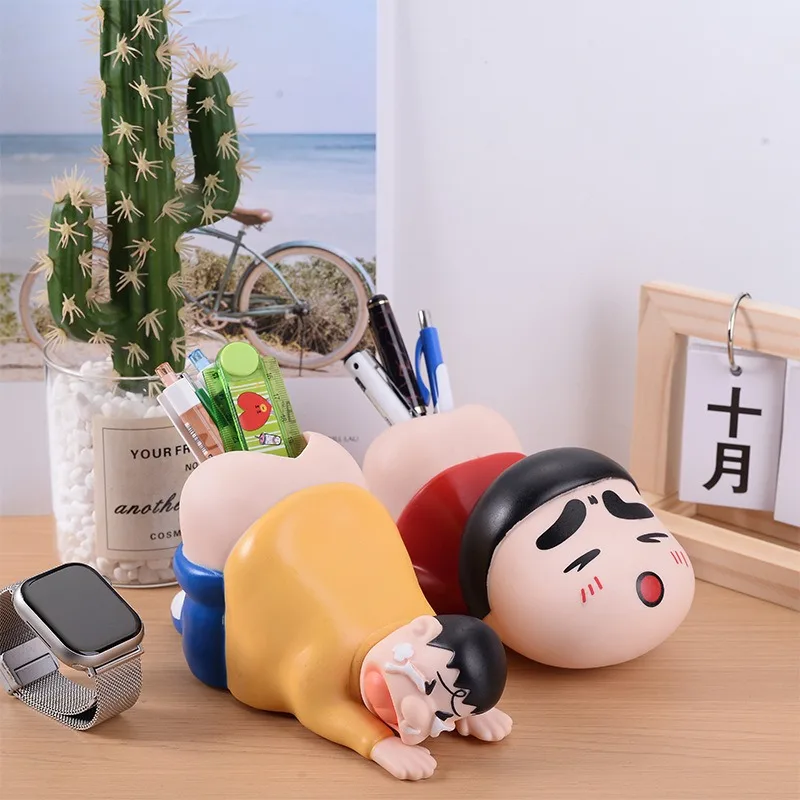 

Kawaii Shinchan Series Funny Piggy Bank Cartoon Character Creativity Mobile Phone Bracket Pen Container Desktop Toy Gift