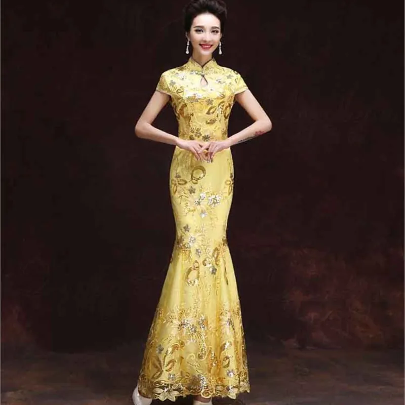 The hostess's catwalk in a cheongsam performance features long form-fitting Chinese-style dress and banquet skirt