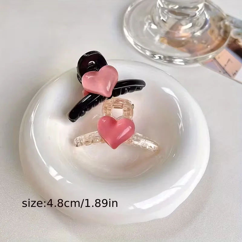 2-teiliges Set mit niedlichen herzförmigen Haarspangen aus Kunststoff, geeignet für Damen. Leuchtende Farben, perfekt für seitliche Ponyfransen – Detail 6