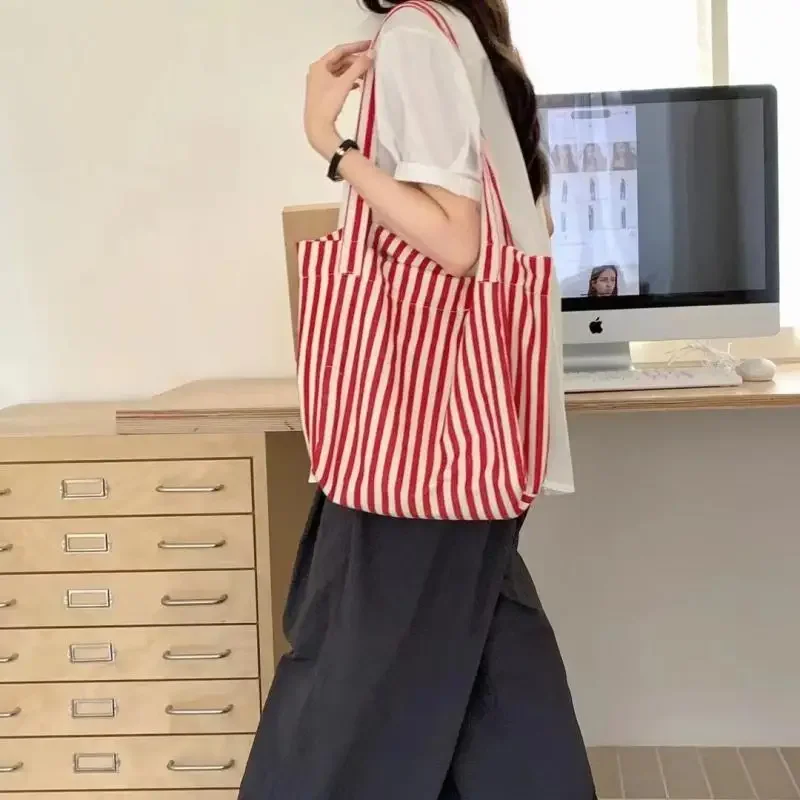 

Fashion Women's Large Capacity Handheld Bag Simple Striped Canvas Bag Ins Artistic Lazy Style Shopping Bag Hundred Shoulder Bag