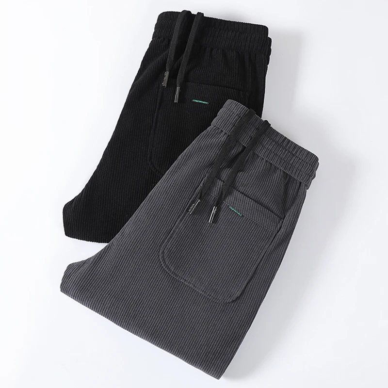 Pantalones de pana casuales para hombre 2027, corte holgado elástico, cintura elástica, jogger, estilo coreano clásico, pantalones negros de marca para hombre, tallas grandes