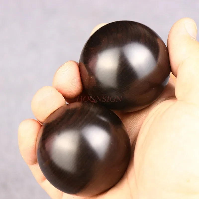 

Ebony purple light sandalwood handball health care ball hand to give gifts to the elderly fitness ball solid wood handball to