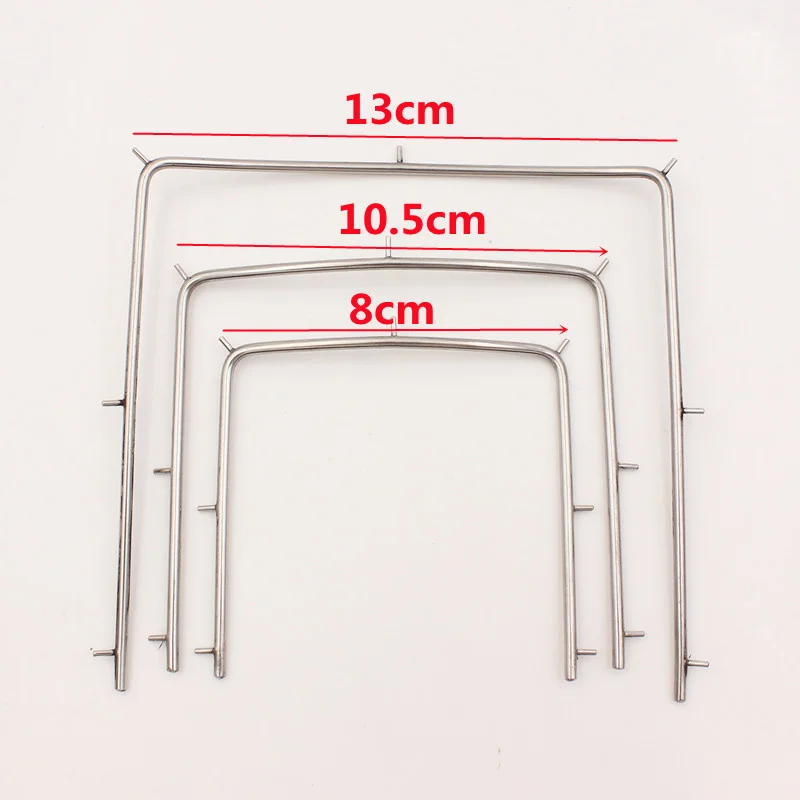 Soporte de marco de presa de goma de acero inoxidable Dental, instrumento Autoclavable para suministros de laboratorio Dental, 1 unidad