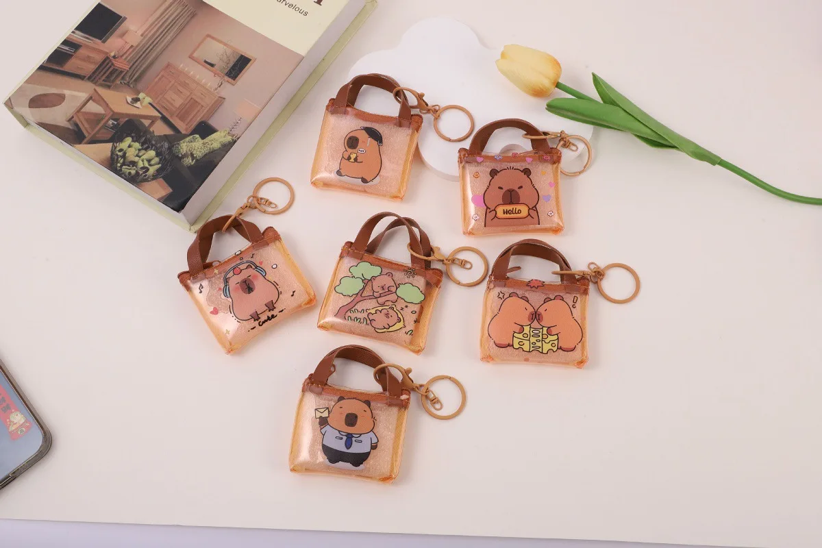 

New cute Capibara keychain, PU children's backpack, cartoon money bag, mini bag