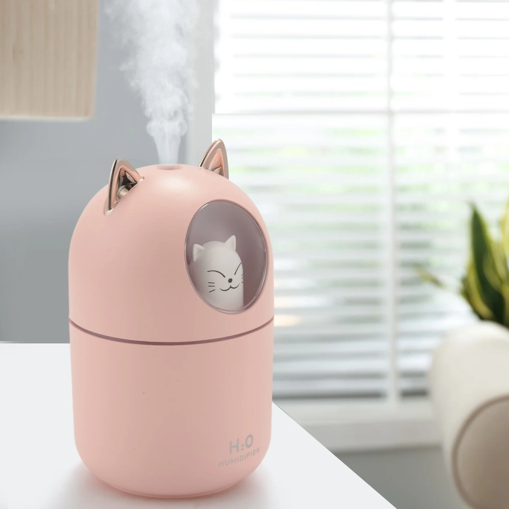 เครื่องทำละอองน้ำแมวเย็นน่ารักสำหรับบ้านไฟกลางคืนแมว Essential อากาศบริสุทธิ์สำหรับห้องเด็กอ่อนทำความสะอาดง่ายการทำงานที่เงียบสงบสีชมพู