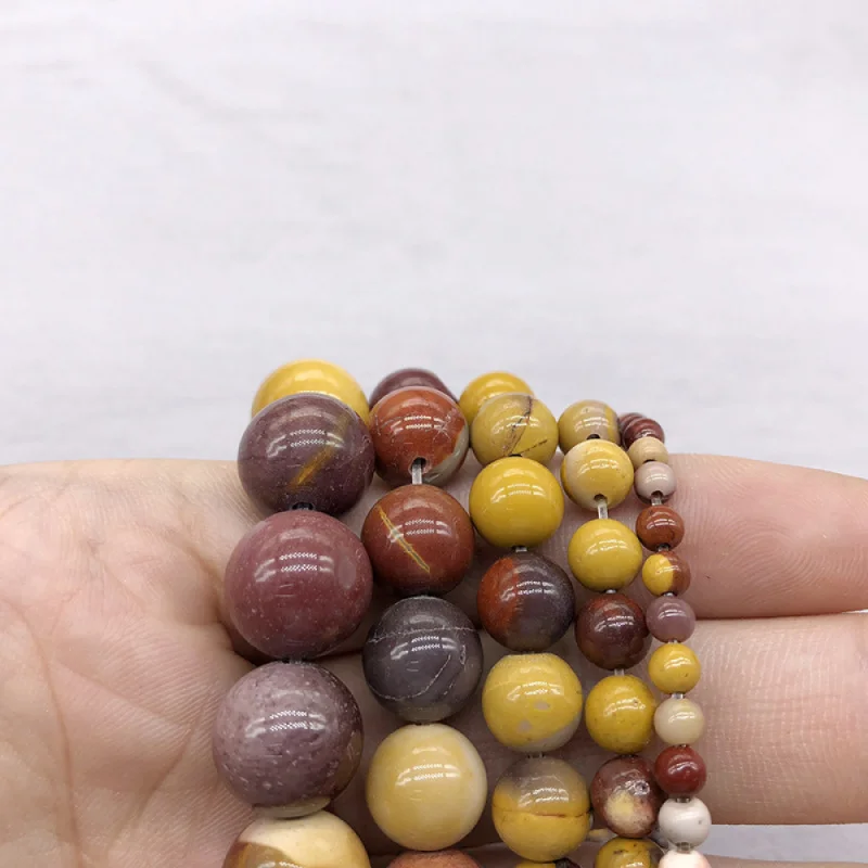 

Natural egg-yellow stone round beadsdiySemi-finished chalcedony accessories earrings men's and women's bracelets necklaces