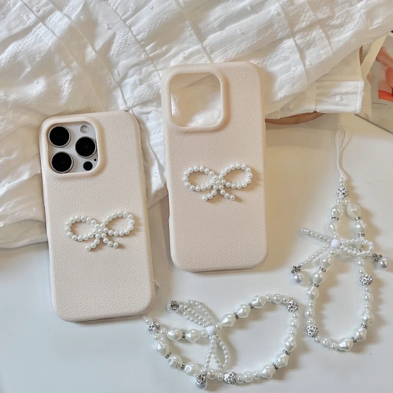 

Imitation leather pearl bow+The bracelet is compatible with Apple devices13PromaxProtective Sleeve15PromaxAnti-Fall14PromaxPhone