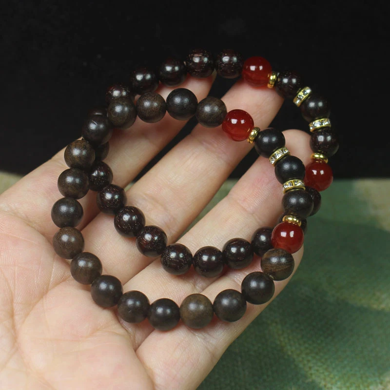 

Zambian Purple Sandalwood 0.8mm Buddhist Precious Agarwood Wood Simple and Unique Bracelet Prayer Beads