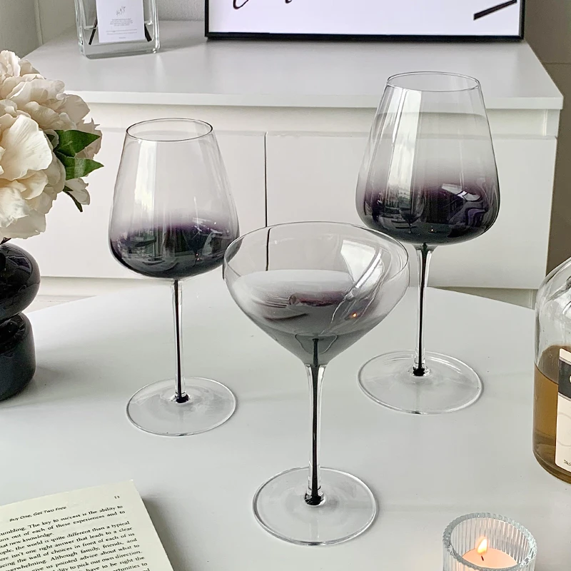 

Instagram style dreamy gradient red wine glass, high legged champagne , water glass, high-end wine , foreign wine