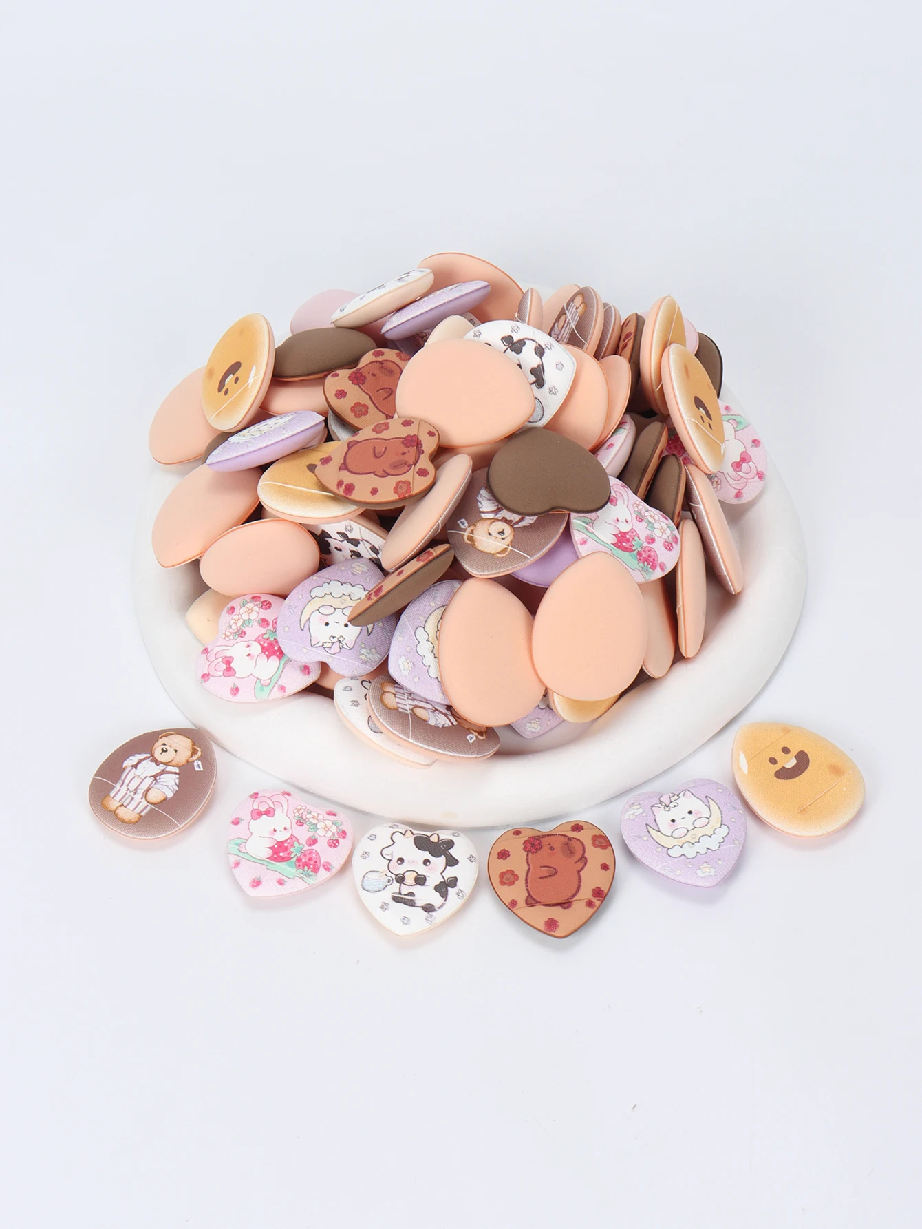 ランダムに印刷された指用パウダーパフ 5-10-20-50-100 個、水にさらされると膨らむ、湿った状態でも乾いた状態でも使用できます