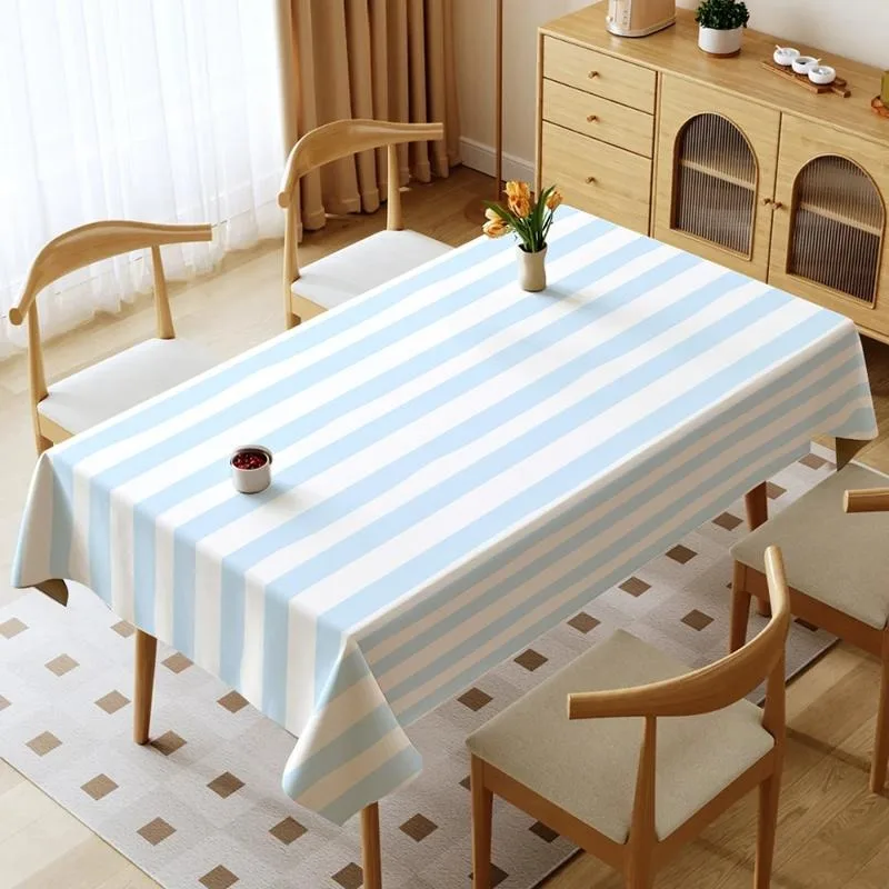 A blue and white striped polyester tablecloth, machine washable and easy to clean, suitable for dining table and coffee table.