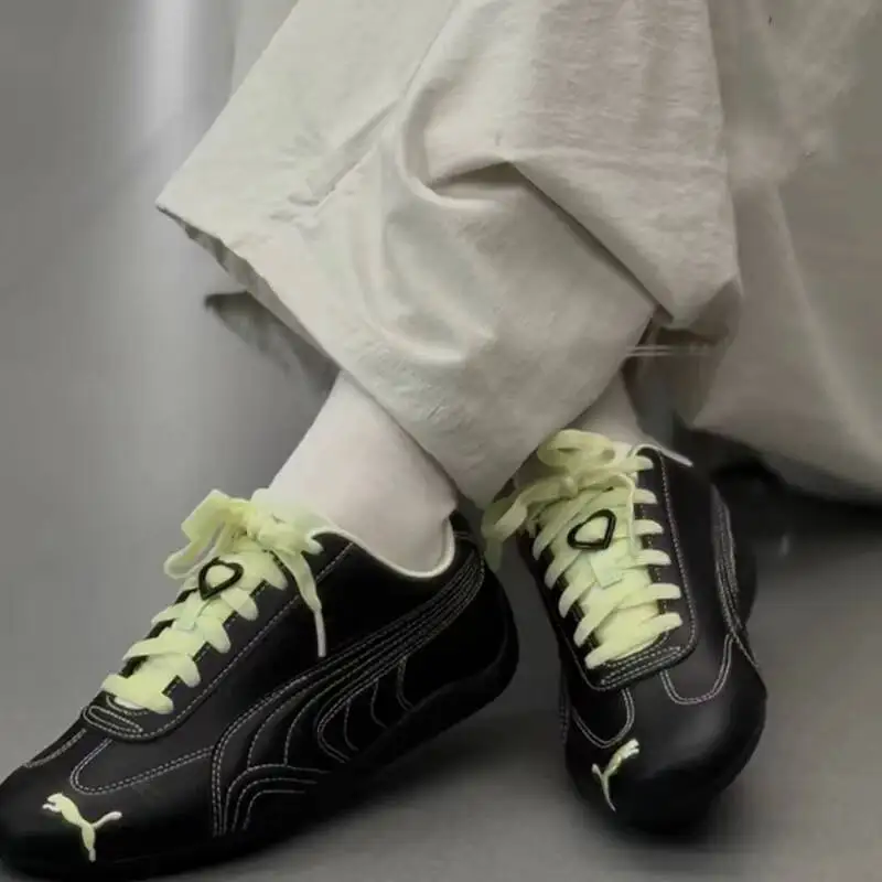 

408101-01All Black Leather Puma Retro Racing Shoes Men Women White Stitch Detail Minimalist Cool Daily Casual Trainers