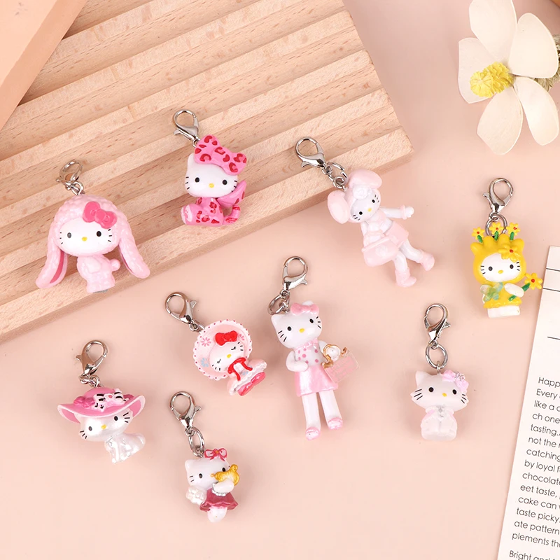 Mini porte-clés mignon Hello Kitty, porte-clés chat KT, joli pendentif de sac, étui pour écouteurs, porte-clés à breloques, cadeau pour un ami