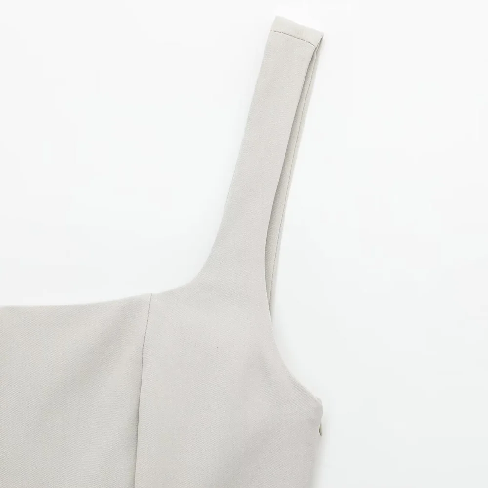 ชุดจั๊มสูทแฟชั่นใหม่สำหรับผู้หญิง คอเหลี่ยม สายเดี่ยว ไม่มีแขน มีกระเป๋าซิป เหมาะสำหรับฤดูใบไม้ผลิ/ฤดูร้อน