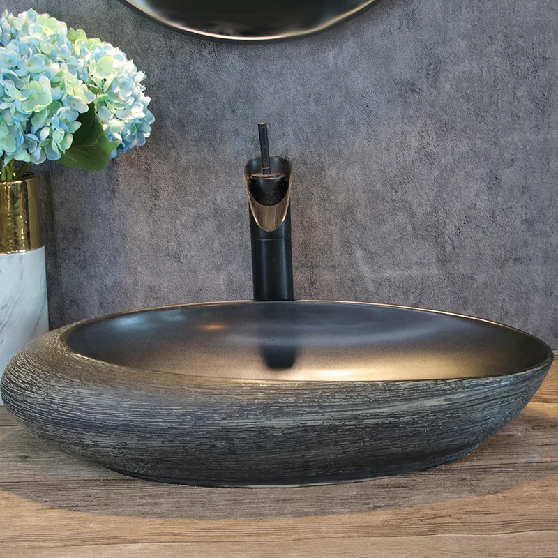 

Artistic washbasin; oval wash basin; single basin for home use; bathroom wash basin; vintage ceramic wash basin.