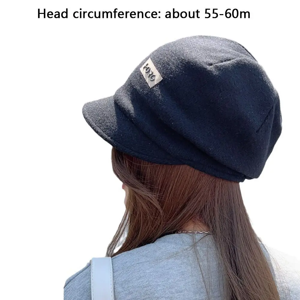 Topi baseball wanita dengan pinggiran lebar, warna solid, tebal, tahan angin, dan hangat.