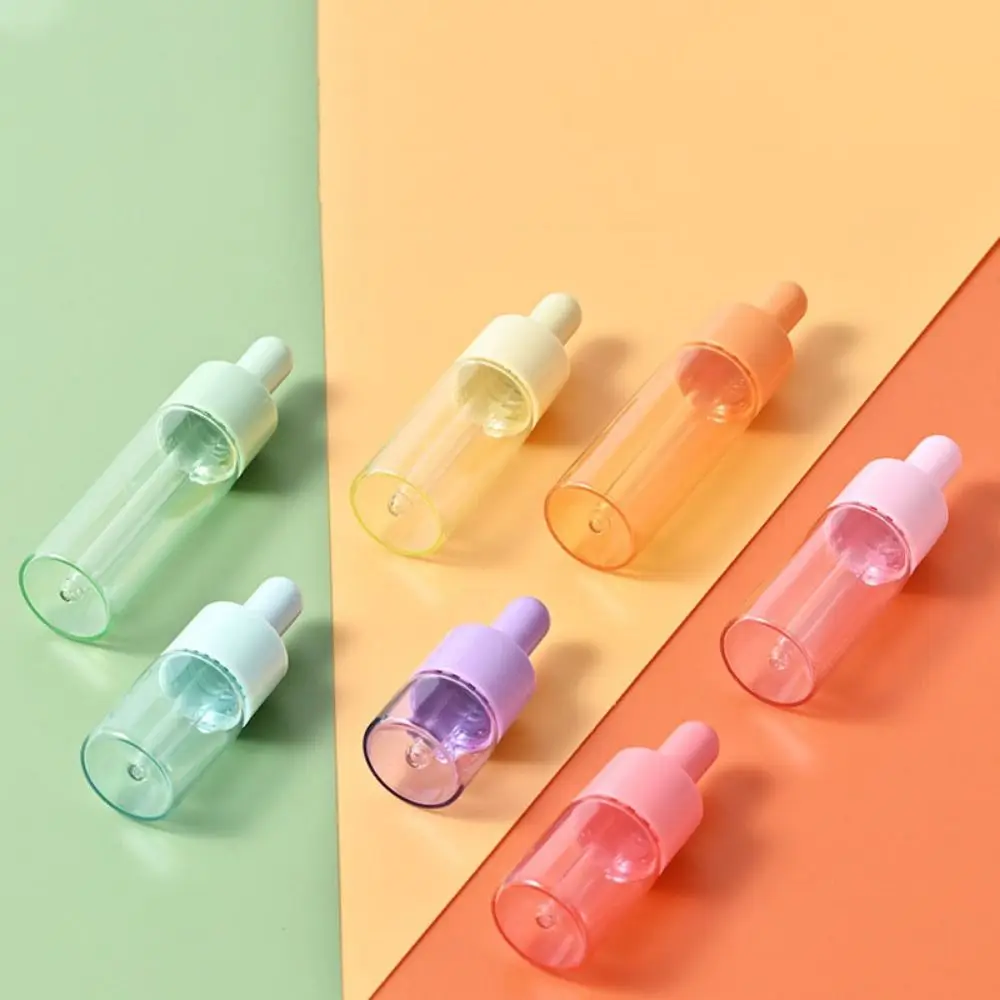 7-teiliges Set mit wiederverwendbaren Mini-Tropfflaschen in Macaron-Farben, wiederverwendbare Behälter mit Gummipumpe, 5 ml/10 ml/15 ml, kleine Glas-Tropfflaschen für unterwegs. – Detail 4