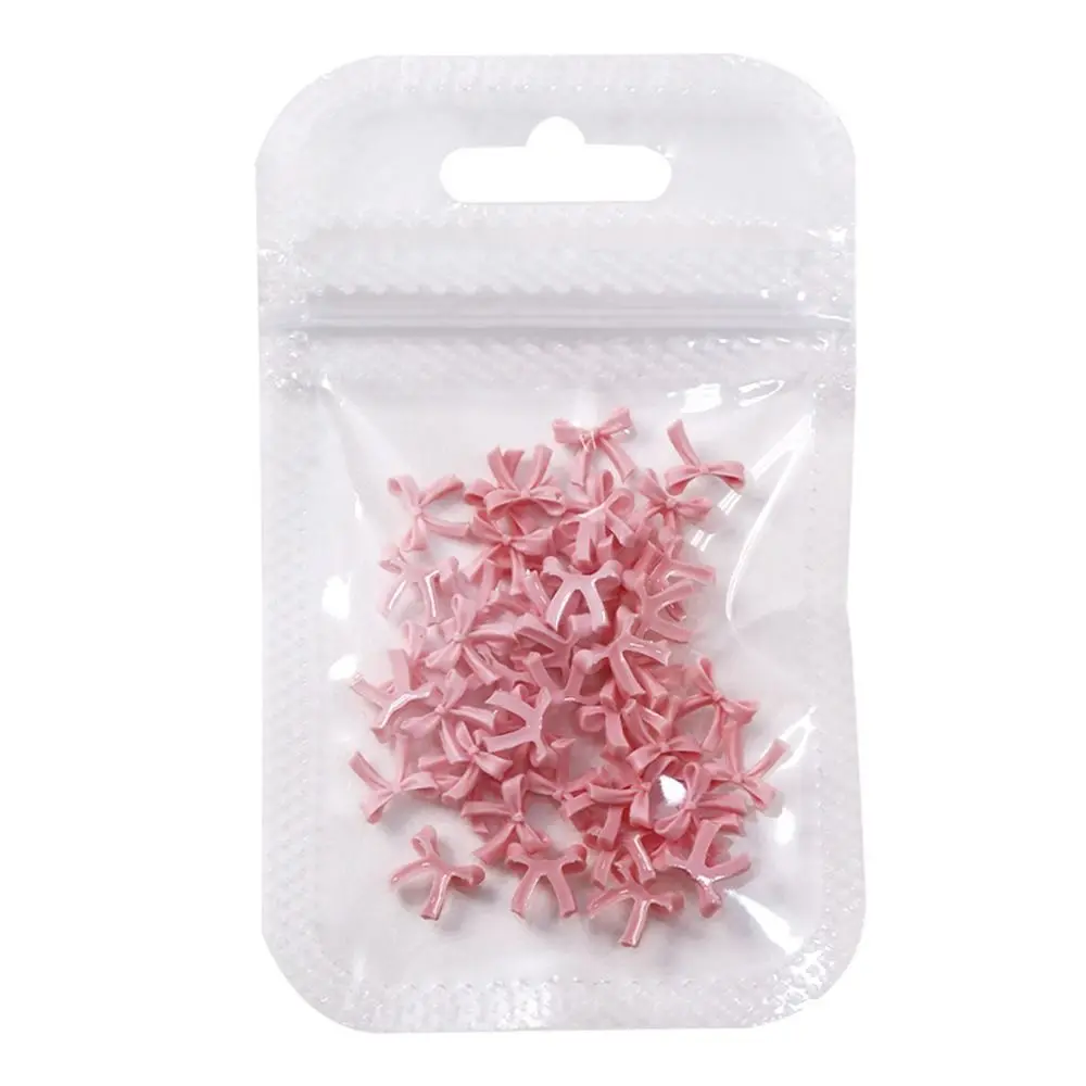 50 stücke Bogen Nail art Zubehör Mini Größe fliege 3D Nail art Dekorationen Gemischte Größe Einfarbig Maniküre Liefert