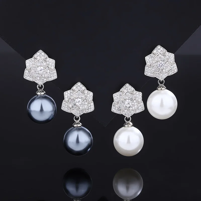 

Korean-style vintage new model gold-plated copper base with pearl inlay Korean-style camellia stud earrings for women 12mm