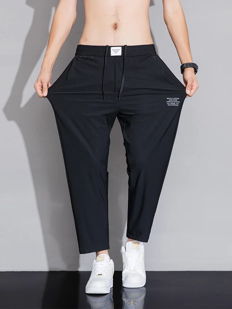 

Summer Men's Trendy New Plus Size Casual Sports Pants Elastic Simple Cool 10XL 170kg thin trousers Nylon spandex ice trousers