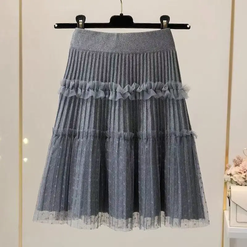 Nuevo 2026 Mini falda de malla de moda Falda corta de punto empalmado para mujer primavera otoño media longitud faldas con volantes de gama alta para mujer