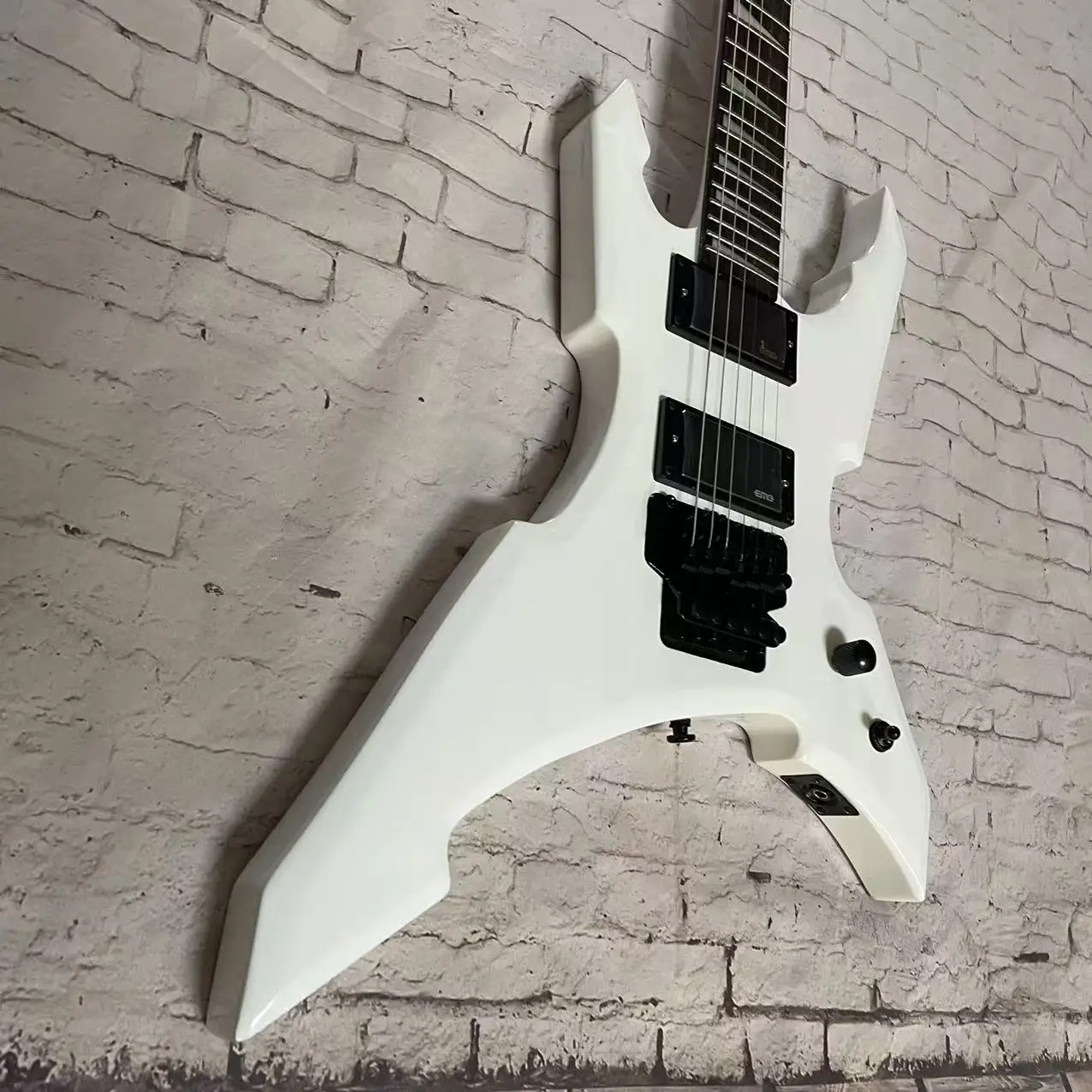 6-chord shaped electric guitar with white body, factory shipping picture, in stock