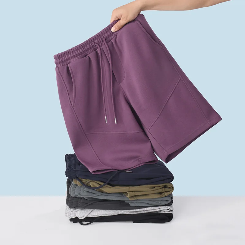 

Новые летние тяжелые модные шорты для мужчин, свободные и универсальные повседневные спортивные брюки средней длины с пятью точками